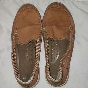 Crocs slip on shoes.